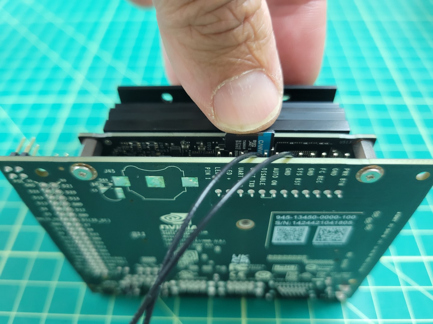 Inserting the micro SD card into the Jetson